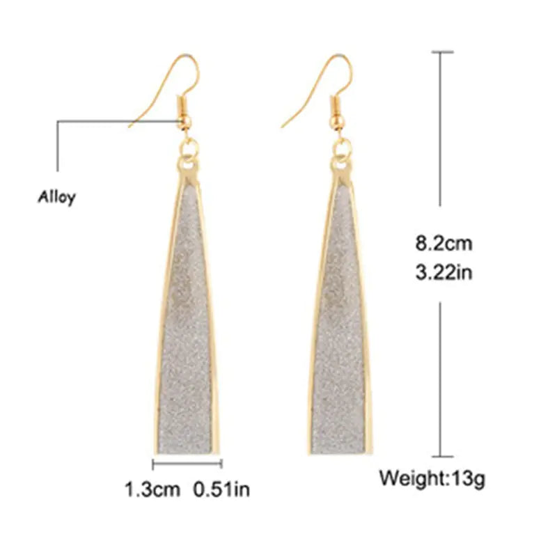 Gold and gray earrings with measurements and material information on a white background